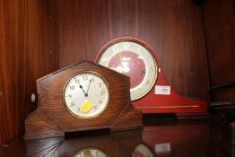 A HERMLE NAPOLEON HAT MANTEL CLOCK TOGETHER WITH AN ART DECO EIGHT DAY EXAMPLE
