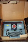 A BOXED VINTAGE MARX DELUXE TYPEWRITER