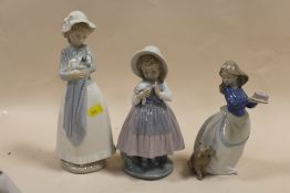 THREE FEMALE NAO FIGURES TO INCLUDE A GIRL WITH A CAKE