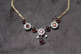 A NECKLACE SET WITH CABOCHON GARNETS, step-cut garnets, seed pearls and diamonds, boxed