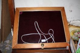 A PINE FRAMED AND GLAZED TABLE TOP DISPLAY CABINET