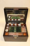A VICTORIAN COROMANDEL LADIES VANITY BOX WITH FITTED INTERIOR, HAVING VANITY JARS WITH HALLMARKED