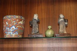 AN ORIENTAL TERRACOTTA PLANTER TOGETHER WITH A PAIR OF MONK FIGURES ON OAK PLINTHS AND A ROYAL