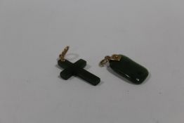 TWO 9 CARAT ROSE GOLD MOUNTED JADE PENDANTS TO INCLUDE A CROSS