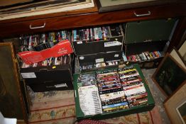 A LARGE QUANTITY OF DVDS ETC. ( 10 TRAYS )
