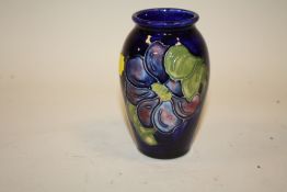 A SMALL FLORAL MOORCROFT VASE