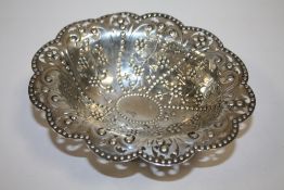 A HALLMARKED SILVER EMBOSSED BOWL RAISED ON PAW FEET APPROX WEIGHT - 140G