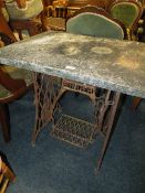 A VINTAGE SINGER CAST TABLE WITH HEAVY MARBLE TOP H-74 W-85 CM