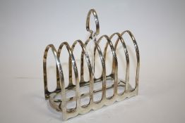 A HALLMARKED SILVER SIX DIVISION TOAST RACK APPROX WEIGHT- 278.9G