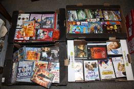 FOUR TRAYS OF DVDS
