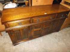 A REPRODUCTION OAK 'OLD CHARM' GOTHIC STYLE SIDEBOARD H-81 CM W-153 CM