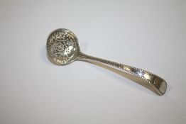 A HALLMARKED SILVER SIFTER SPOON