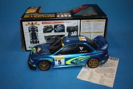 A BOXED TAMIYA QD SPORTS QUICK DRIVE REMOTE CONTROL SUBARU (NO REMOTE)