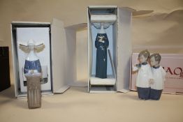 TWO BOXED LLADRO NUN FIGURES, TOGETHER WITH A BOXED NAO FIGURE OF CHOIR BOYS (ONE A/F)