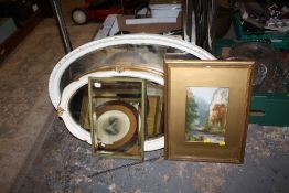 TWO OVAL WALL MIRRORS TOGETHER WITH ANOTHER AND A GILT FRAMED AND GLAZED WATERCOLOUR (4)
