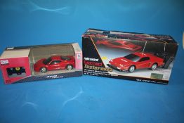 TWO BOXED REMOTE CONTROL FERRARI CARS TO INCLUDE NIKKO EXAMPLE