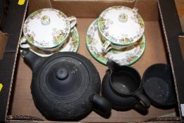 A WEDGWOOD BLACK BASALT THREE PIECE TEA SERVICE A/F TOGETHER WITH A PAIR OF SPODE BYRON LIDDED CUPS