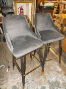 A PAIR OF MODERN DARK GREY UPHOLSTERED BAR STOOLS