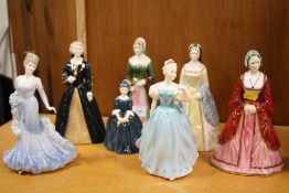 A COLLECTION OF ROYAL DOULTON AND COALPORT FIGURES, SOME A/F (7)