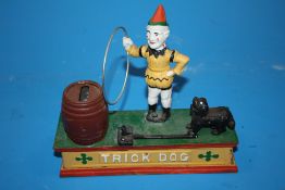 A MODERN CAST METAL TRICK DOG MONEY BOX