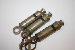 THREE VINTAGE POLICEMANS WHISTLES