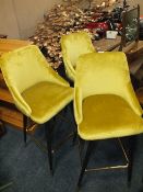 A SET OF THREE MODERN GOLD BAR STOOLS