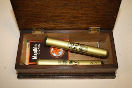 AN OAK CIGAR BOX AND CONTENTS