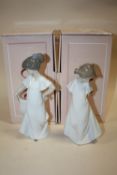 TWO BOXED NAO FIGURES OF YOUNG GIRLS IN WHITE DRESSES