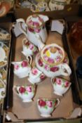 A TRAY OF ROYAL ALBERT OLD ENGLISH ROSE CHINA TO INCLUDE TEAPOT, LIDDED JUG ETC