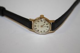 A LADIES 9CT GOLD CASED OMEGA WRISTWATCH