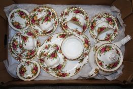 A TRAY OF ROYAL ALBERT OLD COUNTRY ROSES CHINA TO INCLUDE A TEAPOT
