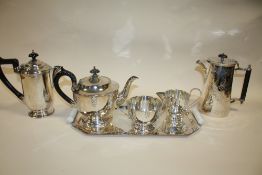 A SILVER PLATED THREE PIECE TEA SERVICE ON SILVER PLATED TRAY TOGETHER WITH TWO OTHER SILVER