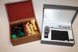 A CLASSIQUE GENTS WATCH AND WALLET SET TOGETHER WITH A BOX OF CHESS PIECES