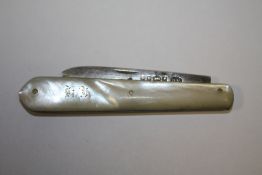 AN ANTIQUE SILVER AND MOTHER OF PEARL FRUIT KNIFE