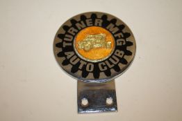 A VINTAGE TURNER MFG AUTO CLUB CAR BADGE