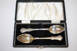 A PAIR BOXED FRENCH STYLE .875 SILVER SPOONS