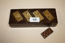A VINTAGE TREEN AND BRASS DOMINOES SET
