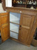A LARGE ANTIQUE PINE HANGING CORNER CUPBOARD H-122 W-100 CM