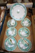 A SET OF SIX QUEEN ANNE CHINA 'MARILYN' PATTERN TRIOS AND CAKE PLATE
