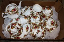 A TRAY OF ROYAL ALBERT OLD COUNTRY ROSES CHINA TO INCLUDE A TEAPOT
