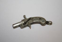 AN ANTIQUE MINIATURE PISTOL POCKET WATCH CHAIN FOB