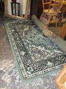 A LARGE 20TH CENTURY WOOLLEN CARPET