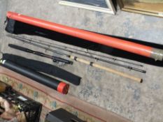 A SHAKESPEARE BLACK AZTEC MATCH 1824 - 390 CARBON FISHING ROD TOGETHER WITH A SHAKESPEARE PRO