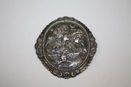 A LARGE FIGURATIVE EMBOSSED BROOCH STAMPED KENARD SILVER