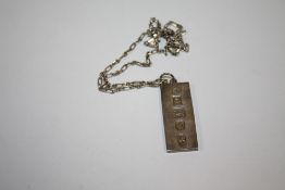 A HALLMARKED SILVER INGOT ON CHAIN