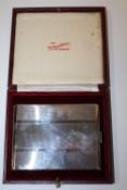 A FORTNUM AND MASON SILVER CIGARETTE BOX IN ORIGINAL BOX