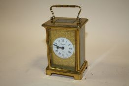 A FRENCH BRASS BAYARD 8 DAY CARRIAGE CLOCK TOGETHER WITH A SWITZER CLOCK/LIGHTER