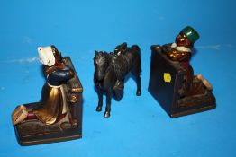 A TABLE LIGHTER IN THE FORM OF A HORSE TOGETHER WITH A PAIR OF METAL RONSON BOOKENDS