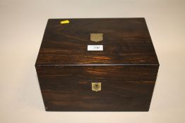 A VICTORIAN COROMANDEL LADIES VANITY BOX WITH FITTED INTERIOR, HAVING VANITY JARS WITH HALLMARKED