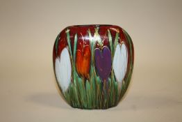 A SIGNED ANITA HARRIS ART POTTERY CROCUS PATTERN PURSE VASE